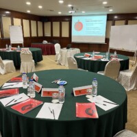 Conference tables all set up for the session