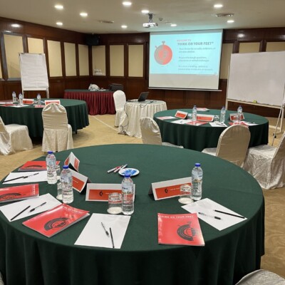 Conference tables all set up for the session