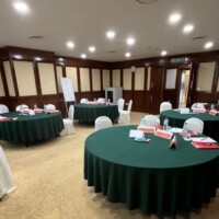 Conference tables all set up for the session