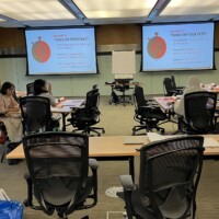 Conference tables all set up for the session