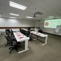 Conference tables all set up for the session