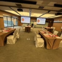 Conference tables all set up for the session